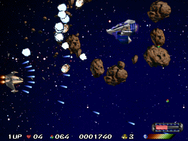 Nebula Fighter (Windows) screenshot: This is the first end of level boss surrounded by a shield of rocks