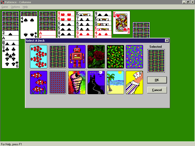 Patience - Columns (Windows) screenshot: This shows the choice of card backs that is available. In the background the player has exposed nearly all the cards in column two