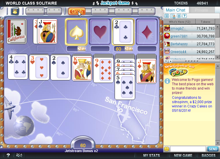 World Class Solitaire (Browser) screenshot: Going to use the Grab power-up in order to move the Ace of spades to the foundation pile.
