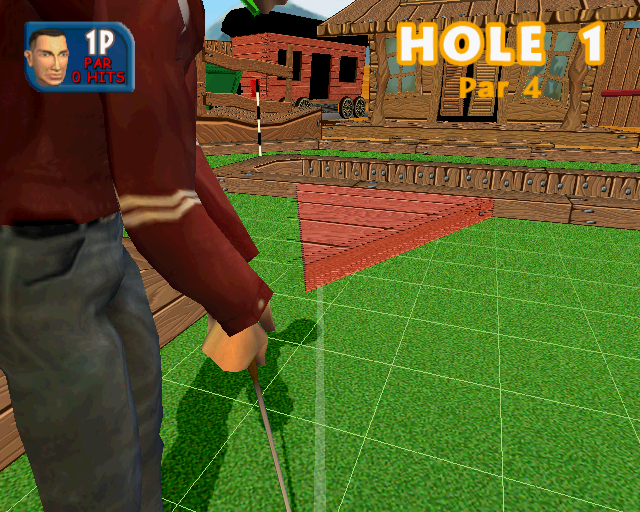 Crazy Golf: World Tour (PlayStation 2) screenshot: The player can zoom in and out to change their viewpoint, this is a zoomed in view. The pale line is an optional putting guide.
