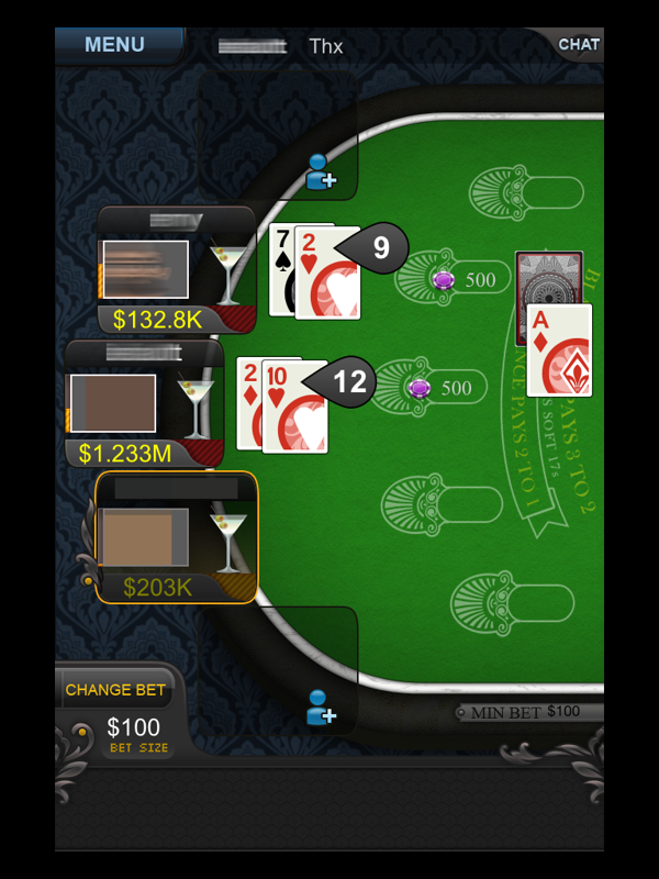 Big Fish Casino (iPad) screenshot: Playing a hand of Blackjack (names and pictures blurred for privacy)