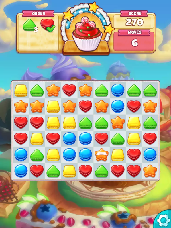 Cookie Jam (iPad) screenshot: The cookie with the stripe (second row from bottom), if matched, will clear an entire horizontal row or vertical column, depending on the stripes direction..