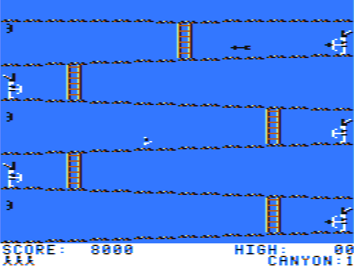 Canyon Climber (TRS-80 CoCo) screenshot: The Indian's got me :-(