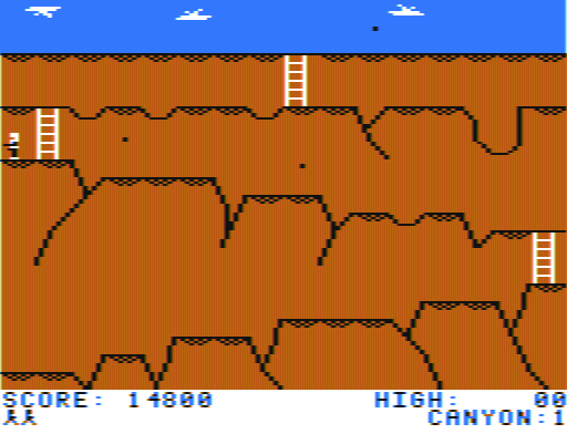 Canyon Climber (TRS-80 CoCo) screenshot: 3rd screen, "Eagle Cliffs" Don't fall down, and avoid the rocks dropped by the eagles.