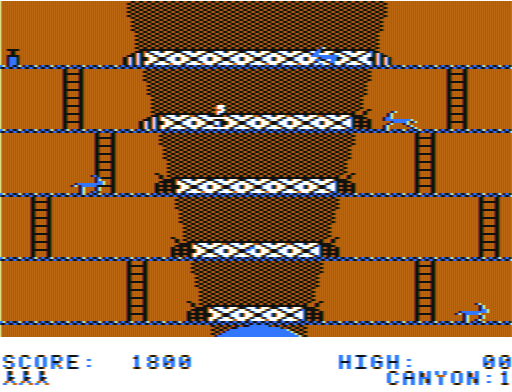Canyon Climber (TRS-80 CoCo) screenshot: 1st screen, "The Crevasse" Avoid the goats, plant dynamite in the bridges, blow the bridges