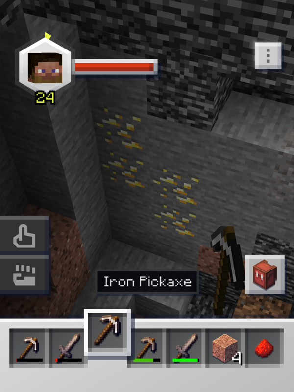 Minecraft Earth (iPad) screenshot: Here's gold ore. You'll need at least an iron pickaxe or better for these blocks.