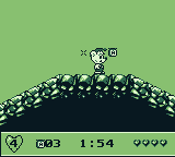 We're Back! (Game Boy) screenshot: I am collecting honey pots.