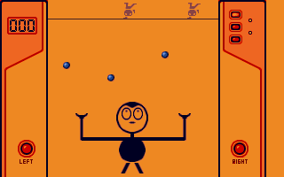 Double Juggle Vegetabobble (Atari ST) screenshot: In-game: you control Charlie or better: his arms. Move left and right to adjust them to the spot where the balls fall down