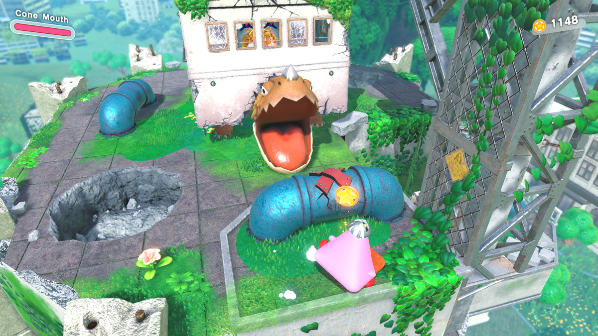 Kirby and the Forgotten Land (Nintendo Switch) screenshot: This huge turtle-like enemy can only be defeated from above using the cone attack