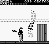 Wayne's World (Game Boy) screenshot: The first boss is a stack of floating records
