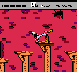 Wayne's World (NES) screenshot: Wayne fights a thug on a platform.