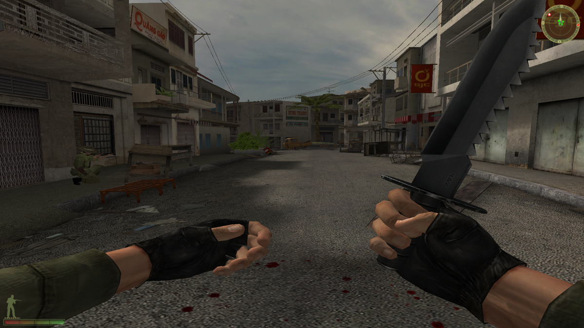 Vietcong 2 (Windows) screenshot: Out on a city street, with a knife in my hand