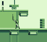 Iron Man / X-O Manowar in Heavy Metal (Game Boy) screenshot: In addition to his laser, he has a sword.