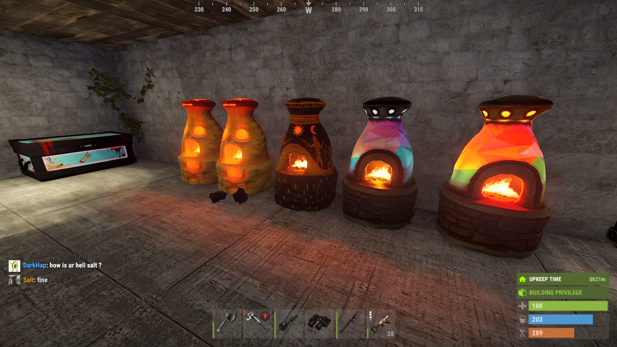 Rust (Windows) screenshot: Ores into usable metals at these small furnaces...