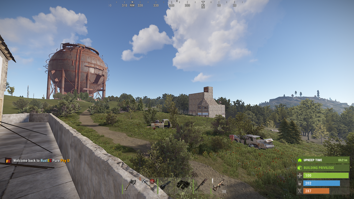 Rust (Windows) screenshot: The Dome monument, a player base and 2 junkpiles