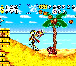 Chester Cheetah: Wild Wild Quest (SNES) screenshot: Cheetah eats cheetahs on a beach