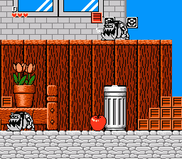 Disney's Chip 'n Dale: Rescue Rangers (NES) screenshot: Mechanical dogs attack