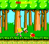 Wonder Boy (Game Gear) screenshot: Throwing your hatchet at a snail