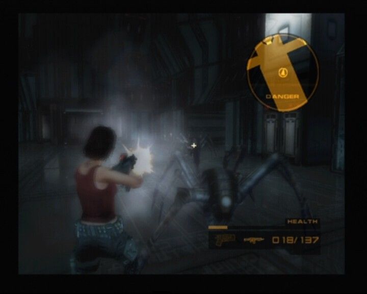 Headhunter: Redemption (PlayStation 2) screenshot: Attacking the great mechanical spiders from their only weak point... at the back