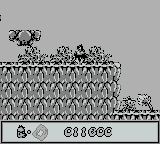 Chuck Rock (Game Boy) screenshot: Brambles hurt