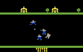 Chuck Norris Superkicks (Commodore 64) screenshot: Three on one?! I've been knocked down...