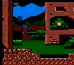 CrossFire (NES) screenshot: Firing with a rocket launcher at a tank apparently stuck in the wall