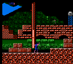 CrossFire (NES) screenshot: Use grenades to blast those out of reach soldiers and turrets