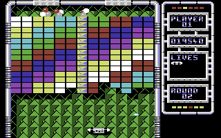 Arkanoid: Revenge of DOH (Commodore 64) screenshot: Destroying bricks on round two