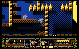 CJ's Elephant Antics (Commodore 64) screenshot: A monkey blocking your path...