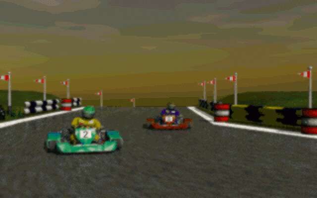 Manic Karts (DOS) screenshot: Two karts are racing with each other (intro)