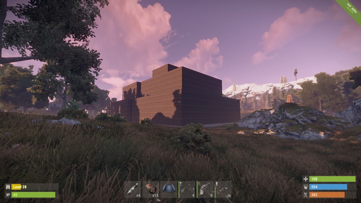 Rust (Windows) screenshot: A very durable base. Lasted ~2 weeks before collapsing during a raid. (alpha version win.939.86)