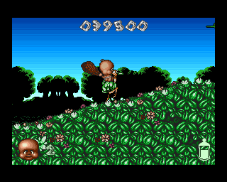 Chuck Rock II: Son of Chuck (Amiga) screenshot: There is also one of a few special means of transport. Sitting on the back of the bird Chuckie can run faster and jump farther.