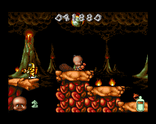 Chuck Rock II: Son of Chuck (Amiga) screenshot: Enemies that uses flame throwers and blow up after they are being treated with a club.