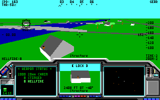 LHX: Attack Chopper (DOS) screenshot: Flying over a town in Vietnam (LHX cockpit)