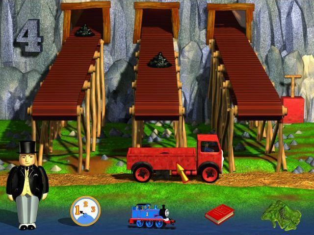 Thomas & Friends: Trouble on the Tracks (Windows) screenshot: The trains are short of coal so Lorry has to fetch some. Here the player has to position the lorry so that it catches coal as it falls from the conveyor belts. Tools come down the belts too and they have to be avoided