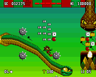 Zool 2 (Amiga) screenshot: Snake is also a mean of transportation.