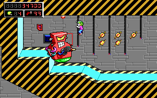 Commander Keen 5: The Armageddon Machine (DOS) screenshot: Keen hangs on for dear life (EGA)