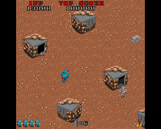 Commando (Amiga) screenshot: Enemies are coming out of those shacks