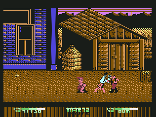 Double Dragon II: The Revenge (Commodore 64) screenshot: Enemy doing a cartwheel to injure you