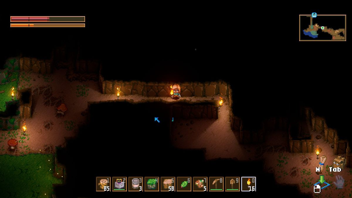 Core Keeper (Windows) screenshot: Mining out corridors and adding torches to make travel easier.