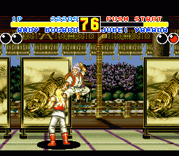 Fatal Fury 2 (SNES) screenshot: Jubei Yamada jumps from the background, through a dressing screen, to the foreground. An example of the pseudo 3D gameplay.