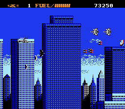 Airwolf (NES) screenshot: In the city, resistance continues from enemy forces