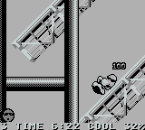 Cool Spot (Game Boy) screenshot: Slide down the rails
