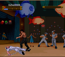 Dragon: The Bruce Lee Story (SNES) screenshot: Mr. Lee assumes the victory position