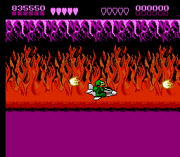 Battletoads (NES) screenshot: And quickly turns into the fire realm where you pilot a jet through deadly fireballs and firewalls