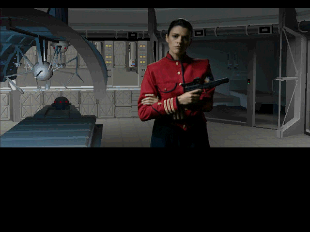 Mission Critical (DOS) screenshot: Lt. Commander Tran Points a Gun at You