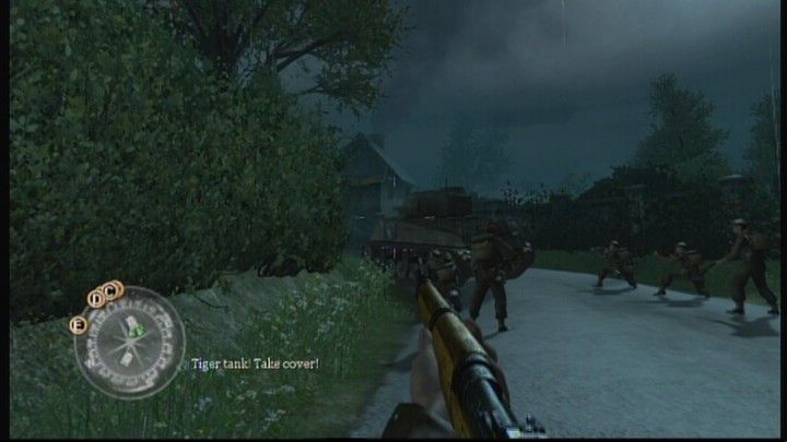 Call of Duty 2 (Xbox 360) screenshot: Approaching the city at night should play to our advantage against Tiger tanks.