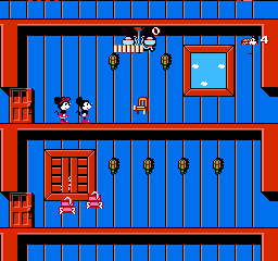 Mickey Mousecapade (NES) screenshot: Avoid obstacles like these jumping chairs!