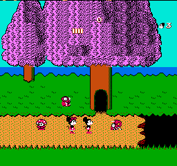 Mickey Mousecapade (NES) screenshot: Hmm, where do you suppose this door goes?