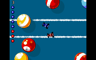 Micro Machines (DOS) screenshot: Don't crash into pool balls...